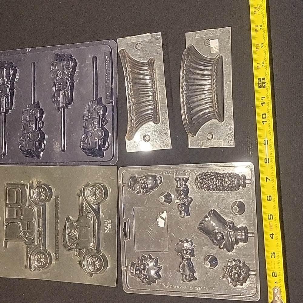 Easter 4 plastic candy molds. Antique car, Fire truck, The Simpsons and a Basket